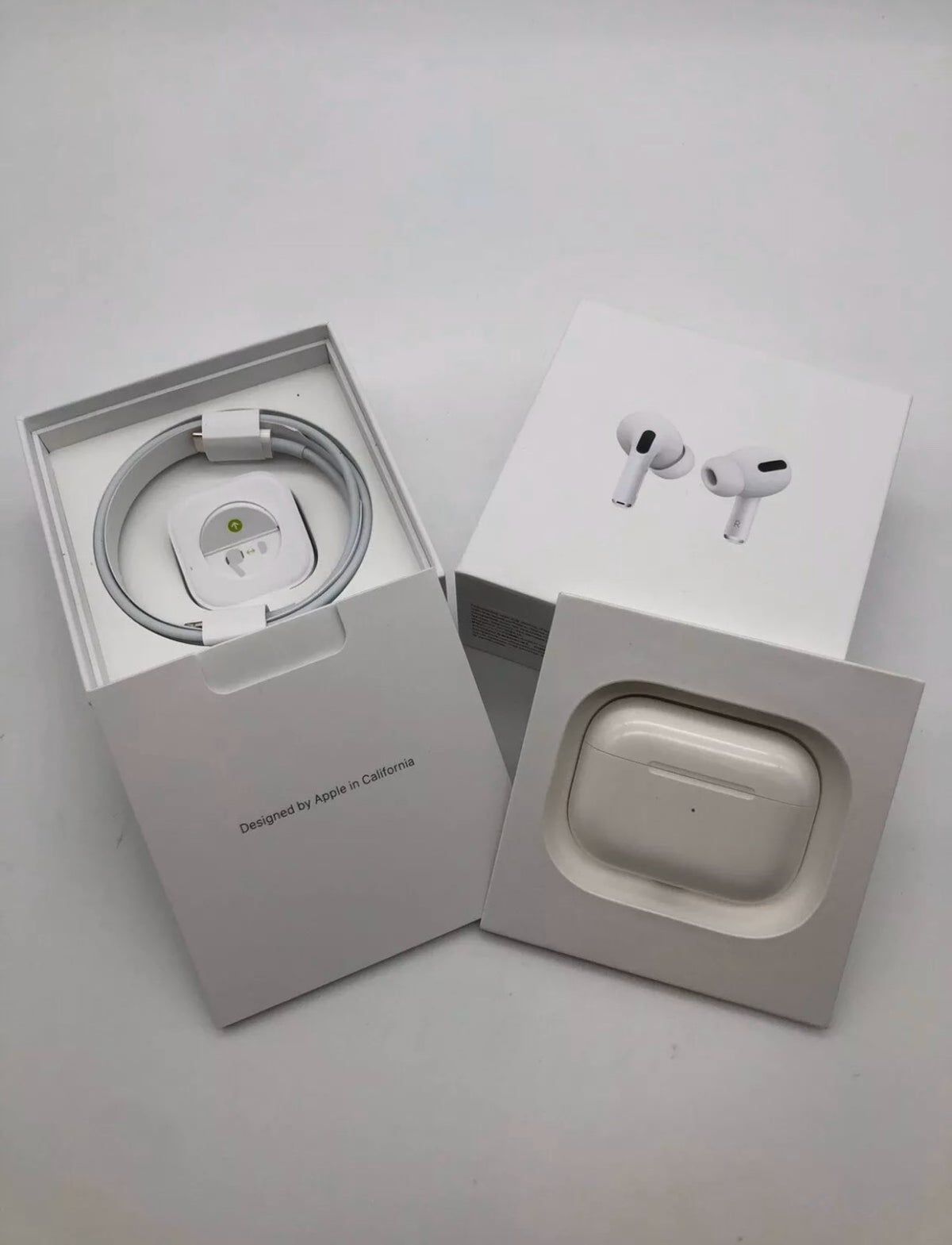 a white box with a white box with airpods on it